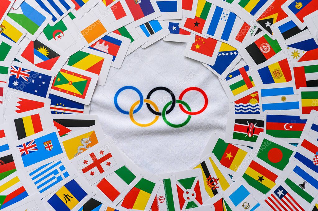 PARIS, FRANCE, FEBRUARY 25. 2020: Summer olympic game, colorful background, flags of all countries in the world