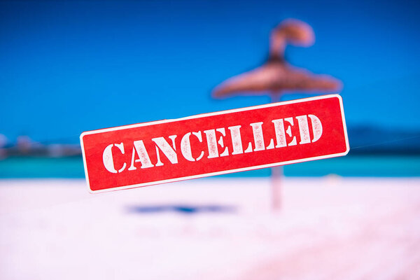 CANCELLED summer holiday, summer vacation on the beach by the sea in Europe due Coronavirus Covid-19 Outbreak.