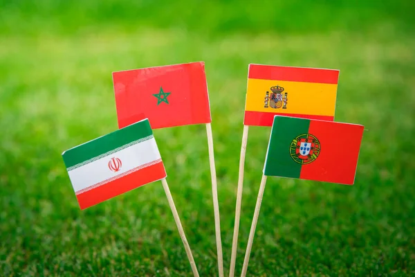 Nationella Flaggor Portugal Spanien Marocko Iran Flaggor Grönt Gräs Fotbollsstadion — Stockfoto