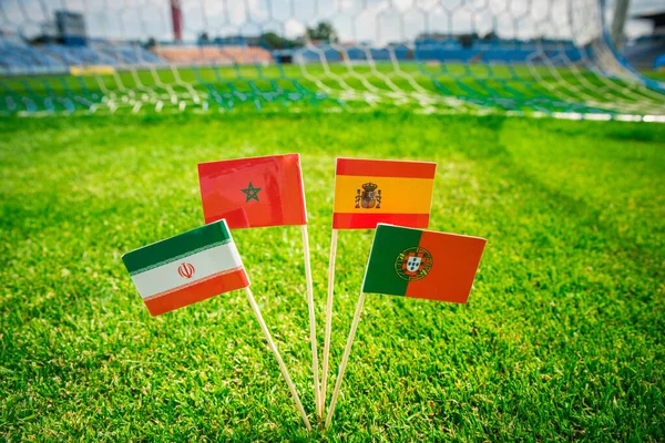 Portugalia Hiszpania Maroko Iran Flagi Narodowe Zielonej Trawie Stadionie Piłkarskim — Zdjęcie stockowe