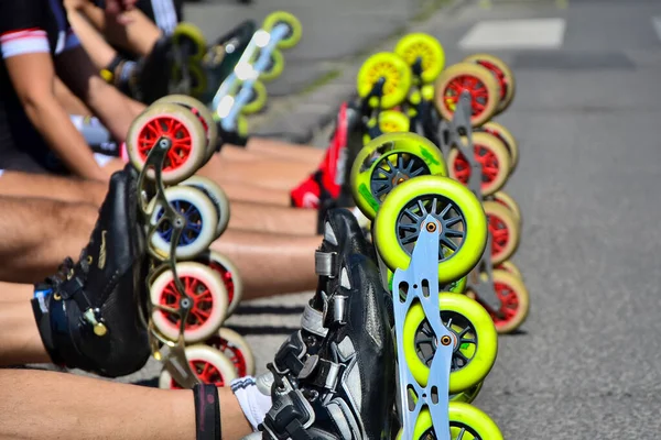 Roller skates wheels before the start of city race for healthy and active life