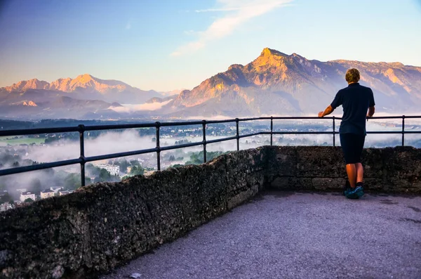 Young Man Standing Top Salzburg Castle Looking Famous Mountains Morning — Stock Photo, Image