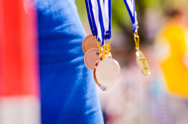 Gold, silver and bronze metal in the air. Nice background for sport competition