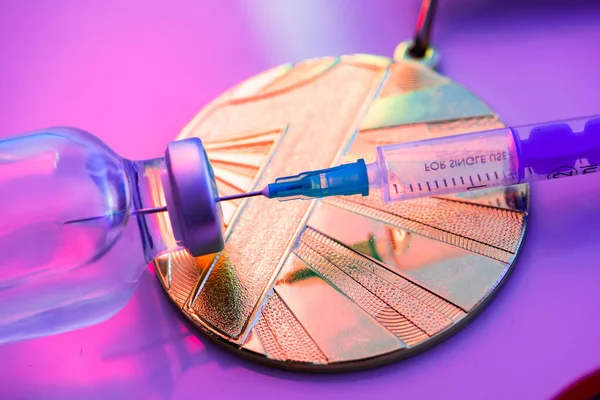Doping in Sport, concept photo, syringe, medical ampoule and gold medal