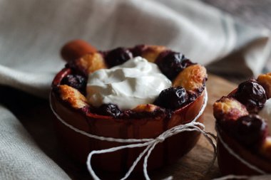 Cottage cheese casserole with cherry and sour cream