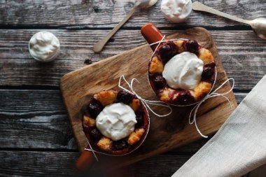 Cottage cheese casserole with cherry and sour cream