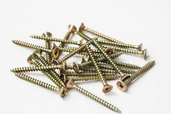 vida, vida, aracı, inşaat aracı, inşaat, metal, oyma, bağlantı elemanları, dış iplik, kendi kendine dokunarak vida, raptiye, çubuk, tork, slot, pek çok, yeni vida, altın vida, sarı vidalar, parlak, katı, inşaat teknolojisi, fikstür, yapı