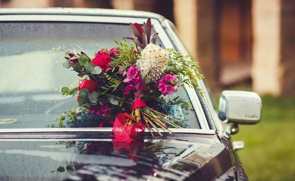 Wedding bouquet in car