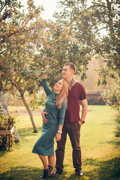 full-height portrait of a happy couple