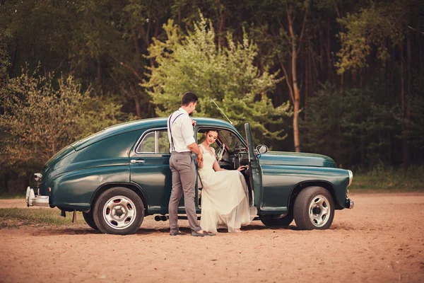 stylish couple in the car