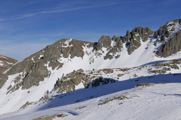 snowy landscape of Montgenvre in the high Alps in winter, france