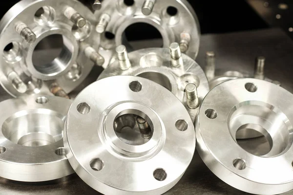 Metal mold of wheel spacers and bolts. CNC industry — Stock Photo, Image