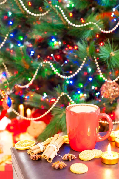 Ginger cookies with cup of coffee on illuminated christmas backg — Stock Photo, Image