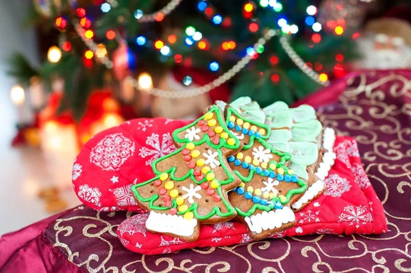 Homemade christmas tree shape gingerbread cookies on illuminated — Stock Photo, Image