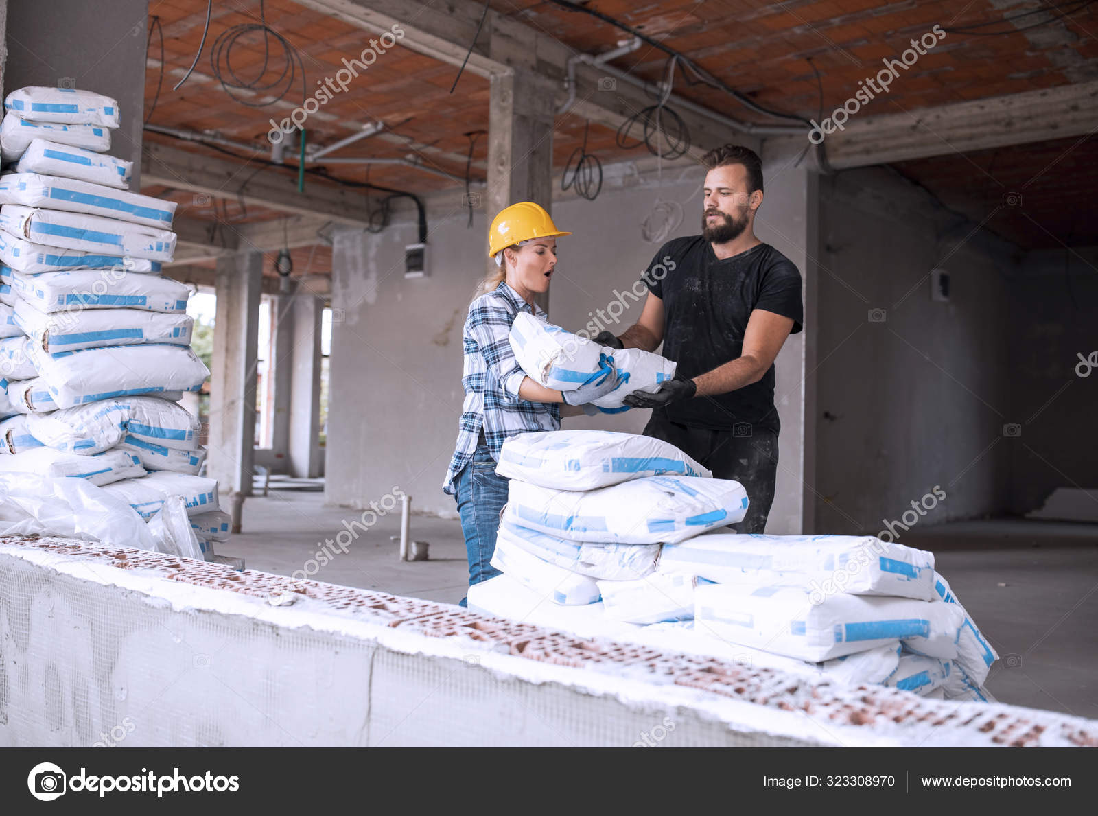 Workman Woman Civil Engineer Carrying Cement Bag Construction Site