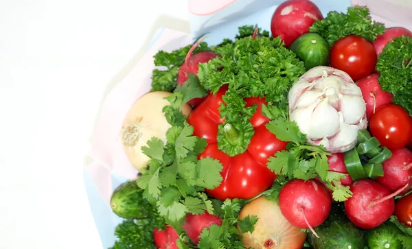 Food grown in a greenhouse garden. Seasonal vegetables.