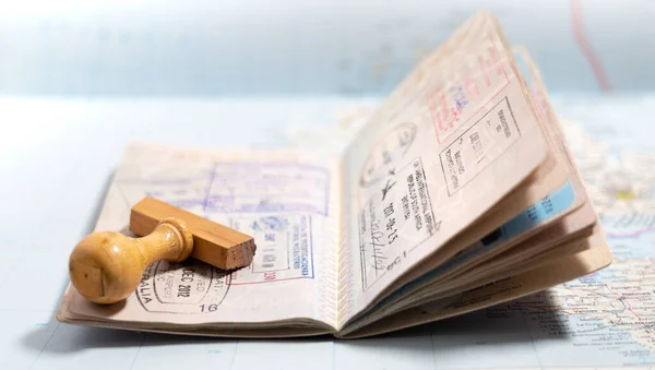 Passport pages with a lot of visa stamps. — Stock Photo, Image