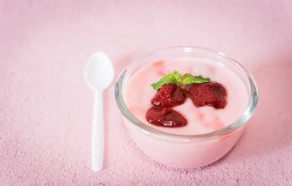 Strawberry yogurt with strawberry  onBaby Gift Colorful candies — Stock Photo, Image