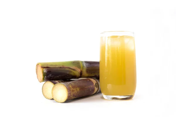 Fresh sugar cane juice in glass on white background — Stock Photo, Image