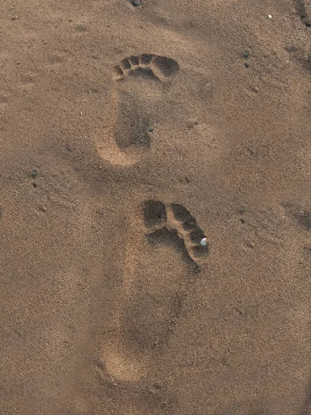 human foot print on sand