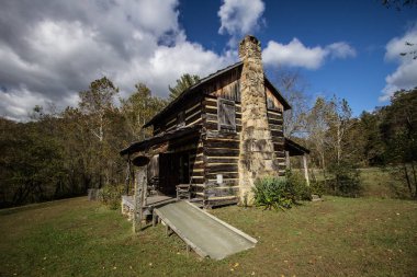 Historical Log Cabin In The Appalachian Mountains Of Kentucky clipart