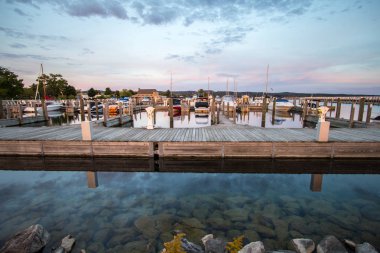 Traverse City, Michigan, USA - October 2, 2017: Marina filled with recreational boats in downtown Traverse City Michigan. clipart