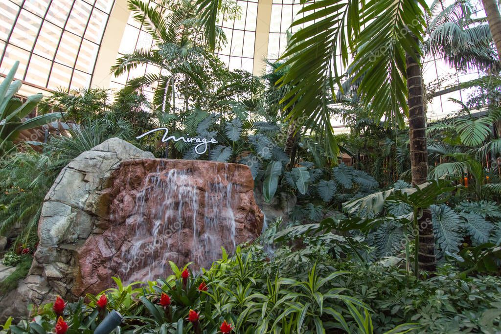 Las Vegas, Nevada, USA - February 20, 2020: Interior of the famous Mirage atrium with the Mirage Casino and resort logo. The Las Vegas property is owned by MGM Resorts International.