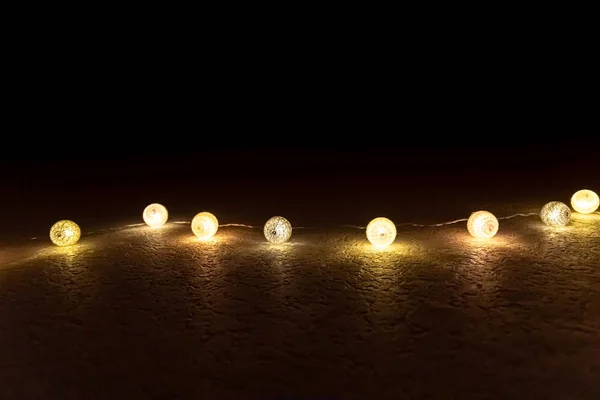Taş zeminde peri ışıkları — Stok fotoğraf