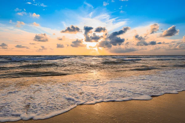 Colourful sunset over sea and waves as background — Stock Photo, Image