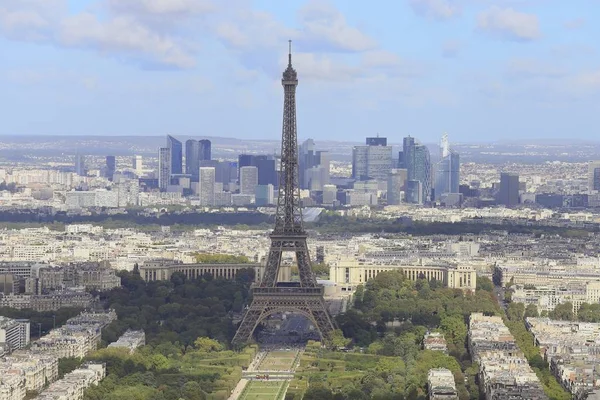 View of Paris city roofs with Eiffel Tower from above and blue sky, France — Stock Photo, Image