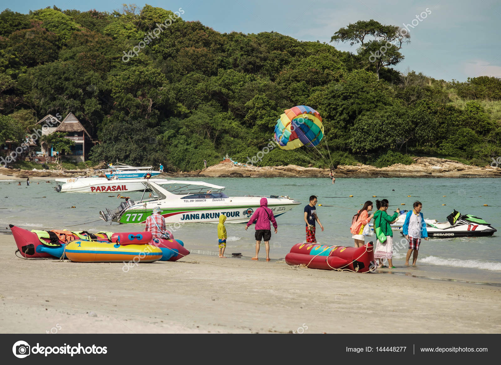 Tourists Enjoy Activities On The Beach At Hua Hin Thailand