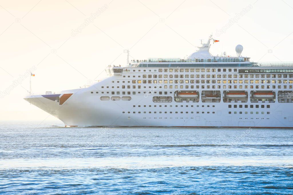Big luxury cruise ship sailing on calm sea