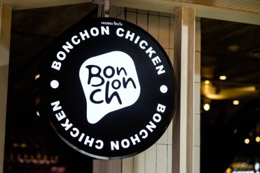 Bonchon Tavuk 'un dairesel tabelalarını yakından çek