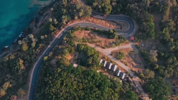 Flying overlooking a jungle road near Yanui Beach in Phuket Thailand — Stock Video