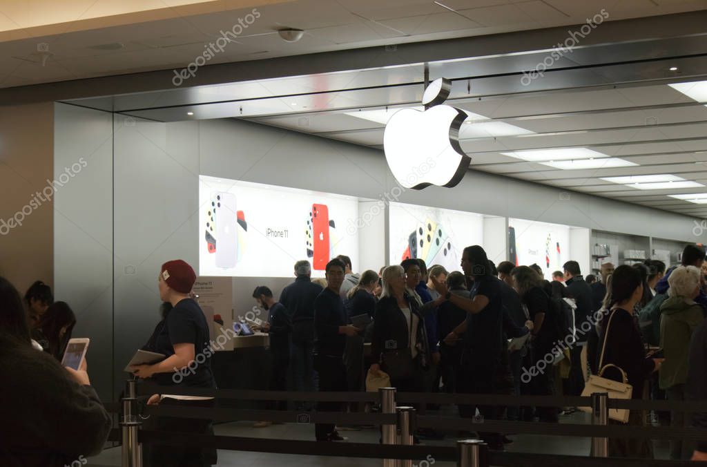 Vancouver, Canada - September 20,2019: Apple officially started selling the iPhone 11 and iPhone 11 Pro. Apple Store is crowded with people waiting for their new iPhones to buy