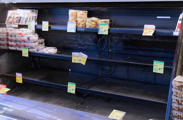 Vancouver, Canada - March 18,2020: Empty Safeway store shelves show shortage of food as Coronavirus (COVID-19) fears people to buy more supplies
