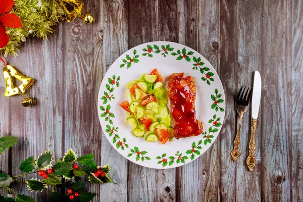 Baked chicken with BBQ sauce and salad on a festive Christmas table. — Stock Photo, Image