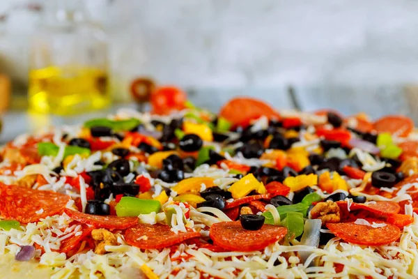 Supreme pizza with olives peppers, sausage and onions. — Stock Photo, Image