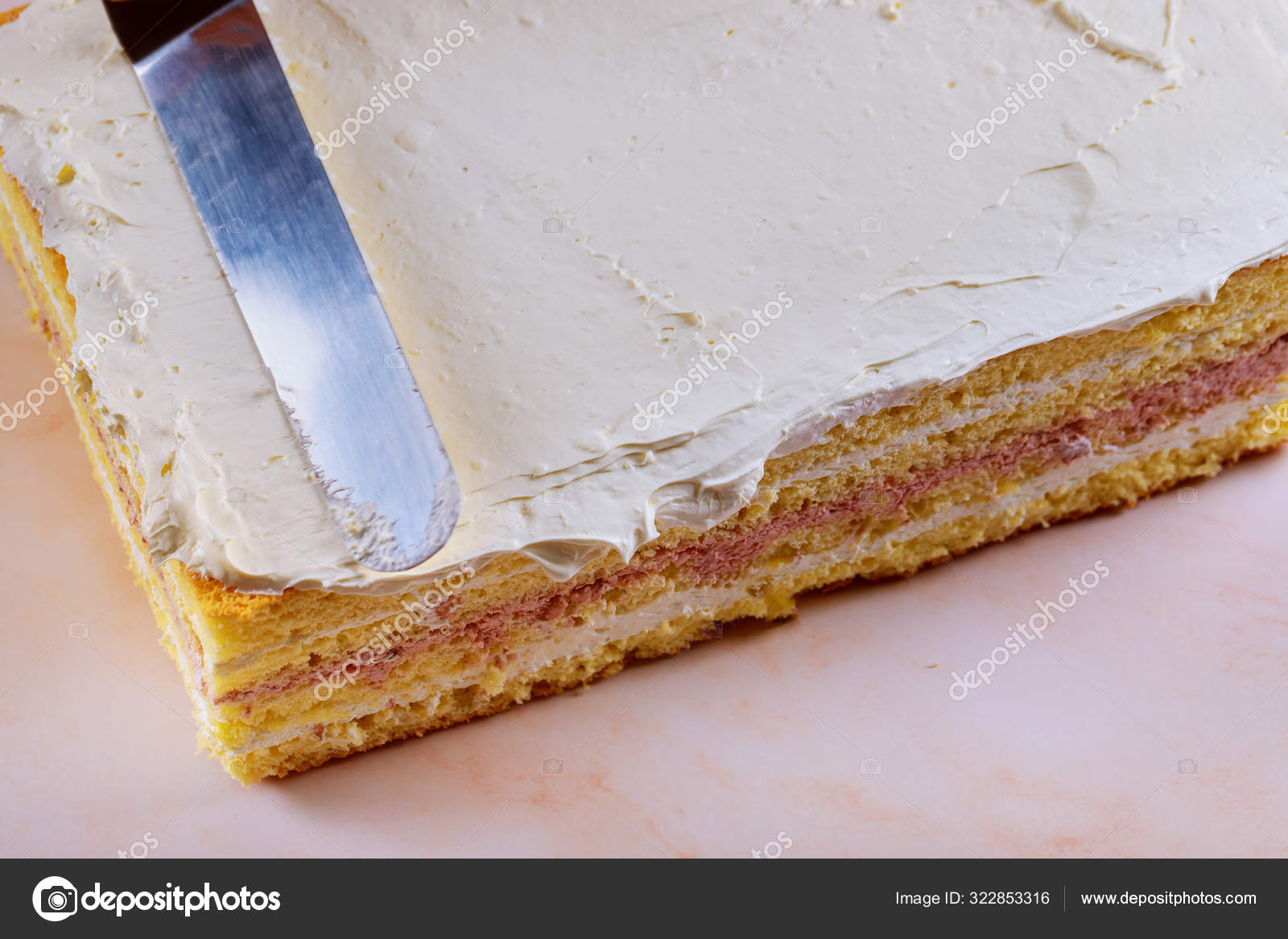 Layer sponge cake with cream cheese and blended sour cherry filling