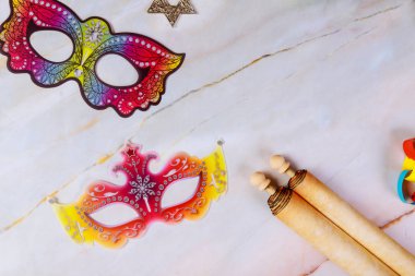 Face masks and papyrus roll for jewish holiday.