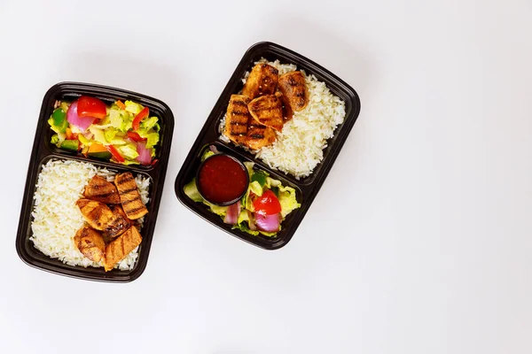 Food delivery or order. Ready meal to eat on food container isolated.