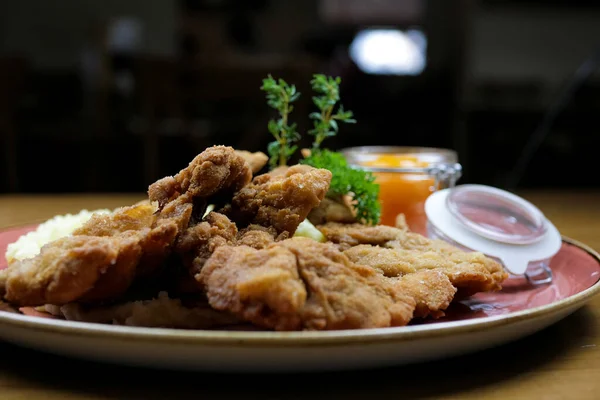 close-up view of gourmet chicken dish on restaurant table