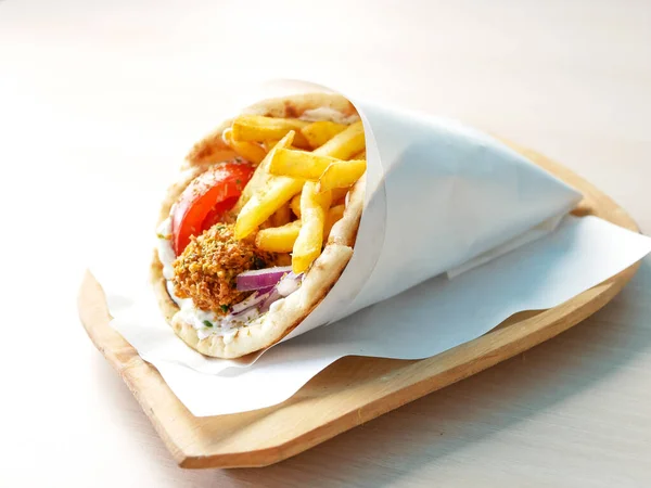 close-up view of delicious greek dish Gyros in restaurant