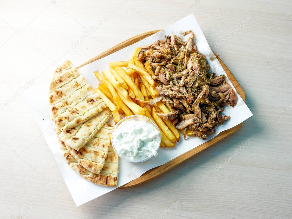 close-up view of delicious greek dish Gyros in restaurant 