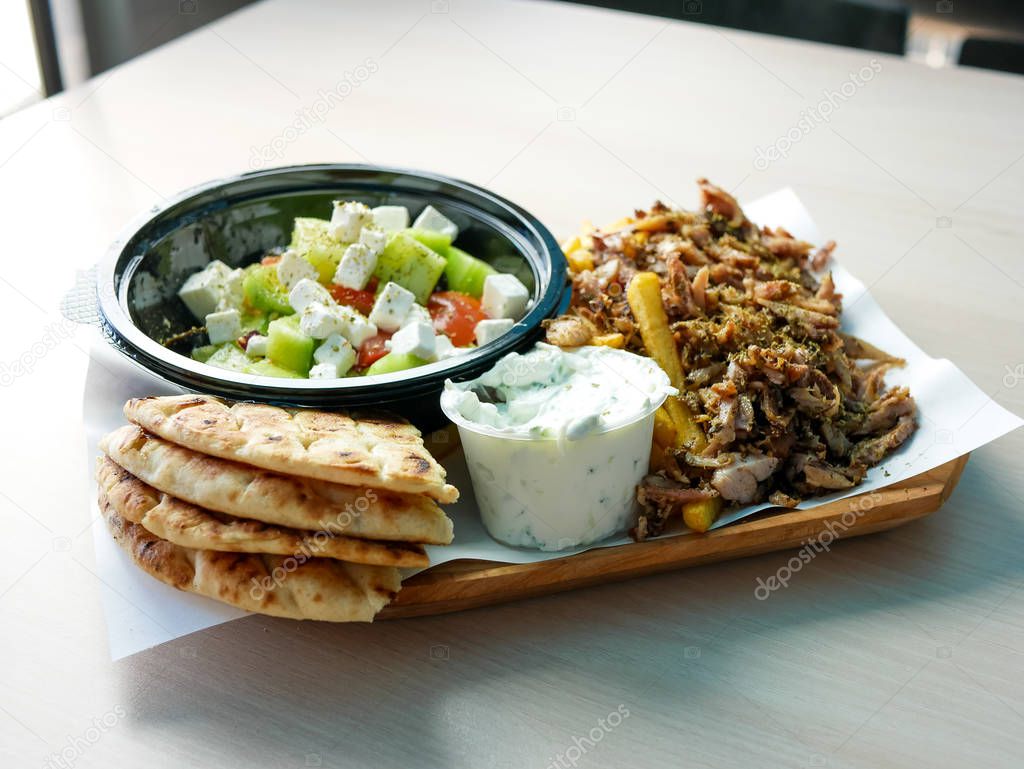 close-up view of delicious greek dish Gyros in restaurant 