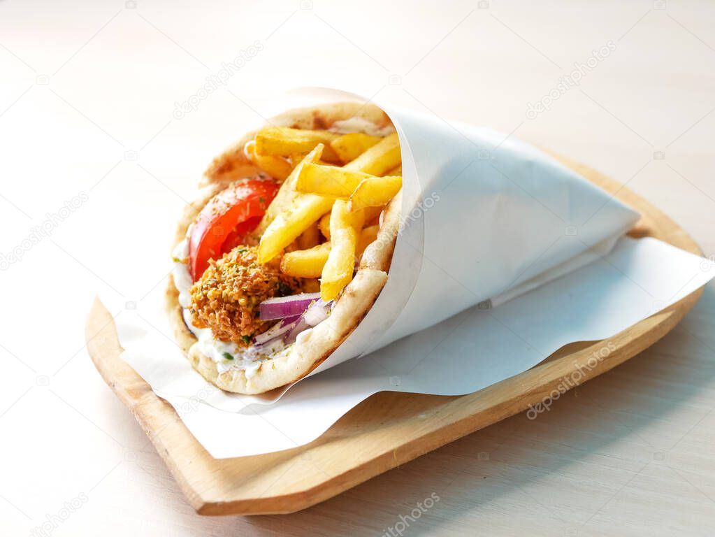 close-up view of delicious greek dish Gyros in restaurant 