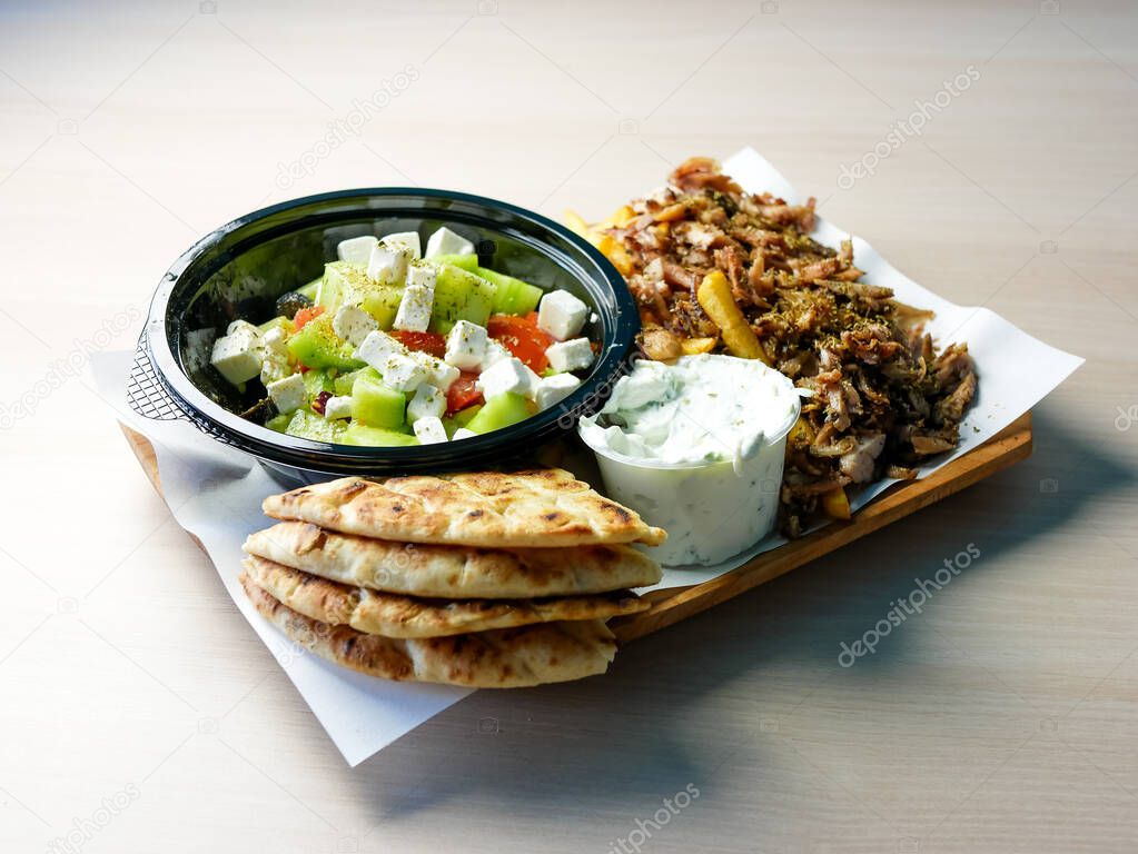 close-up view of delicious greek dish Gyros in restaurant 