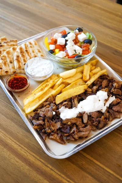 close-up view of delicious greek dish Gyros in restaurant