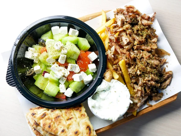 close-up view of delicious greek dish Gyros in restaurant