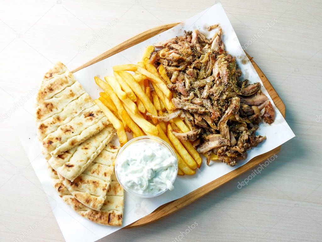 close-up view of delicious greek dish Gyros in restaurant 